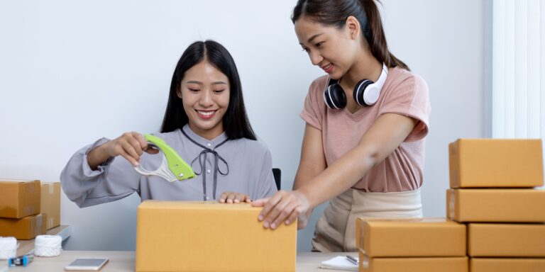 People packing products for delivery