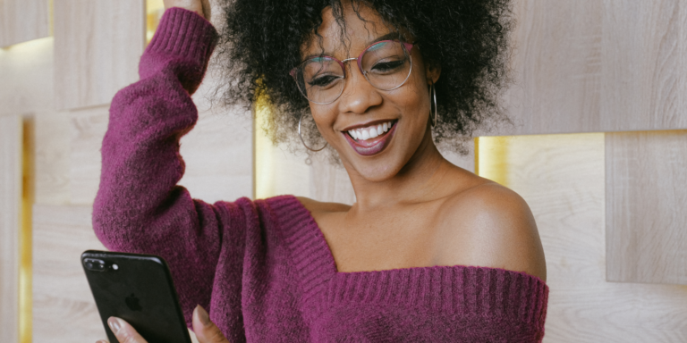 Woman with glasses taking a selfie