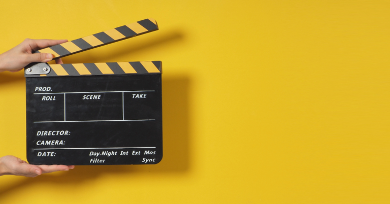 Hands holding a film slate